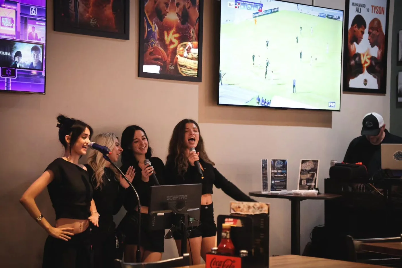 Friends singing at The Hangout Sports Bar & Grill in Cold Spring, Kentucky