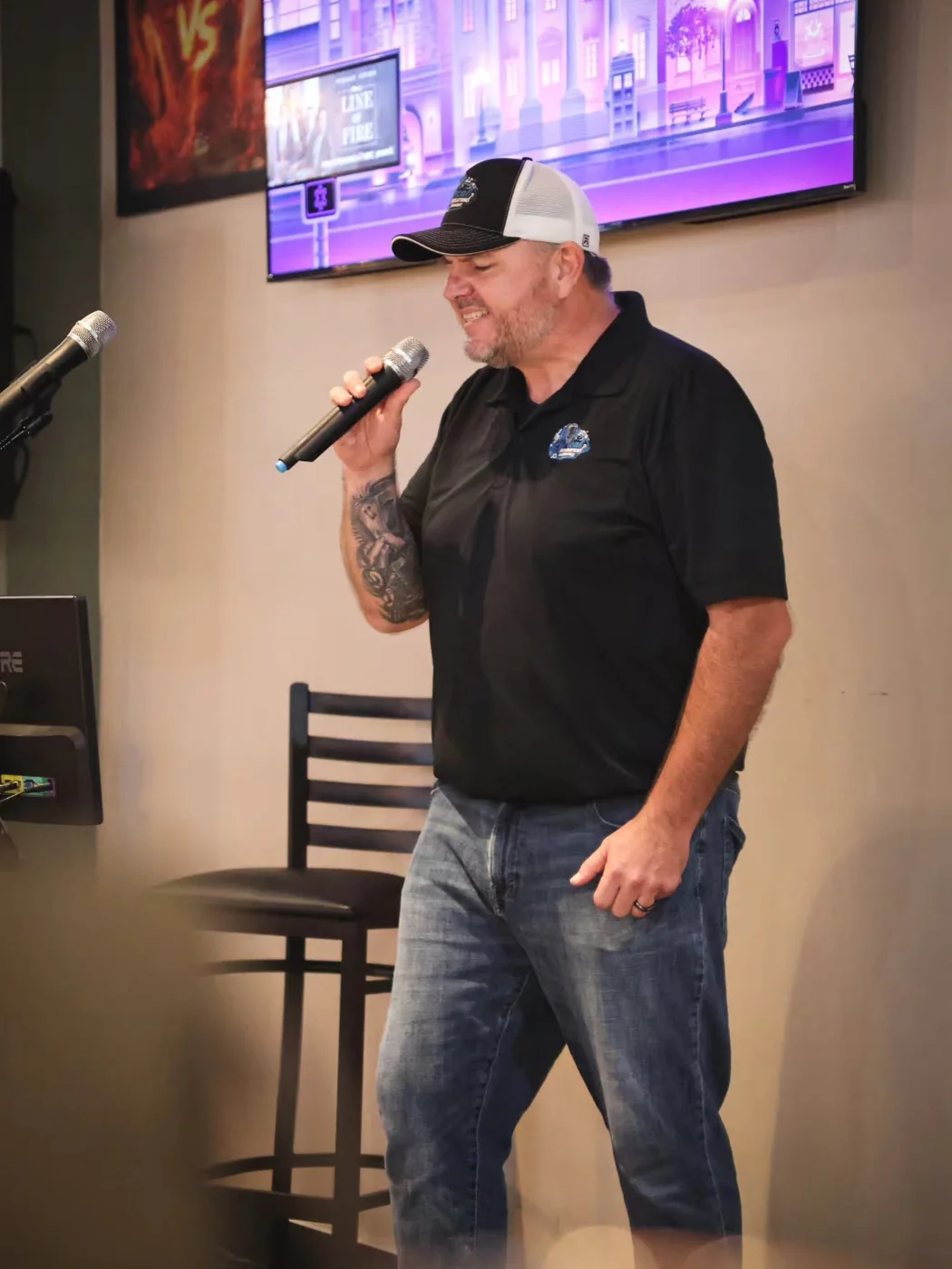 Steve Cooper, host of Lyrical Sensations Karaoke, singing at The Hangout